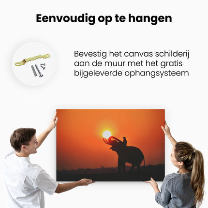 Canvas schilderij ophangen Silhouet van een Olifant bij Zonsondergang