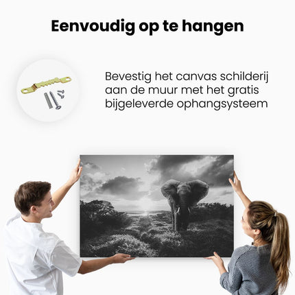 Canvas schilderij ophangen Olifant in het Wild bij Zonsondergang - Zwart Wit