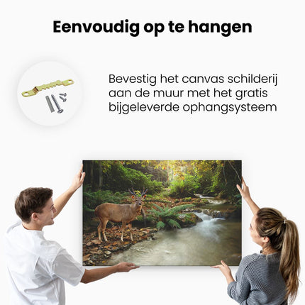 Canvas schilderij ophangen Hert bij een Rivier in een Jungle