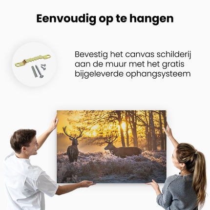 Canvas schilderij ophangen Twee Herten tijdens de Zonsondergang