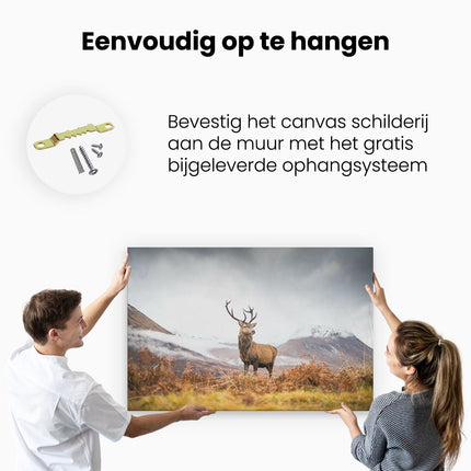 Canvas schilderij ophangen Hert in de Bergen met Mos