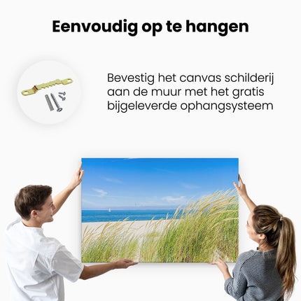 Canvas schilderij ophangen Strand en Zee met een Zeilboot