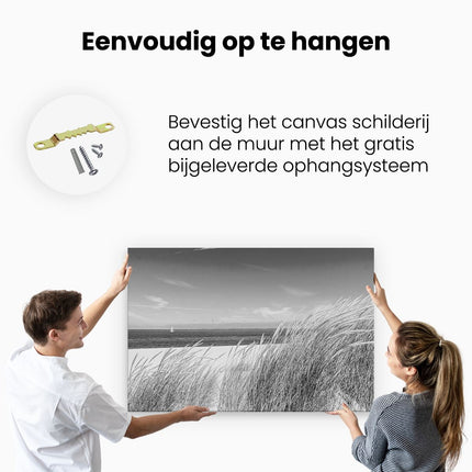 Canvas schilderij ophangen Strand en Zee met een Zeilboot - Zwart Wit
