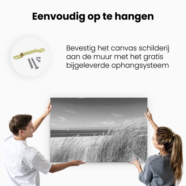 Canvas schilderij ophangen Strand en Zee met een Zeilboot - Zwart Wit