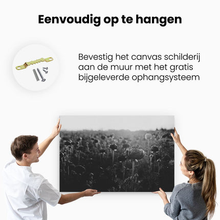 Canvas schilderij ophangen Veld met Rode Bloemen - Zwart Wit