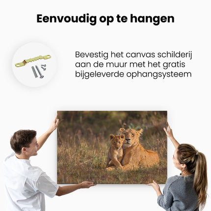 Canvas schilderij ophangen Leeuwin met haar Welp in het Wild