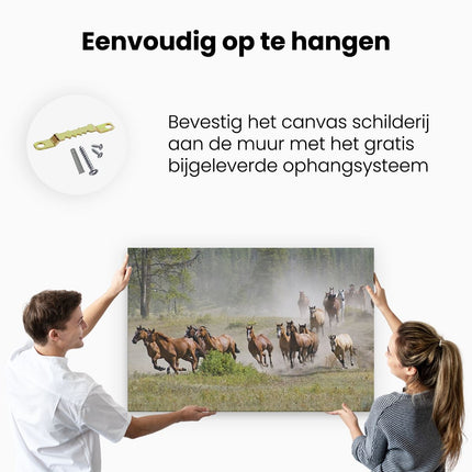 Canvas schilderij ophangen Kudde van Galopperende Paarden