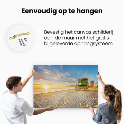 Canvas schilderij ophangen Strandhuisje bij Zonsondergang