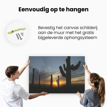 Canvas schilderij ophangen Cactussen bij Zonsondergang in de Woestijn