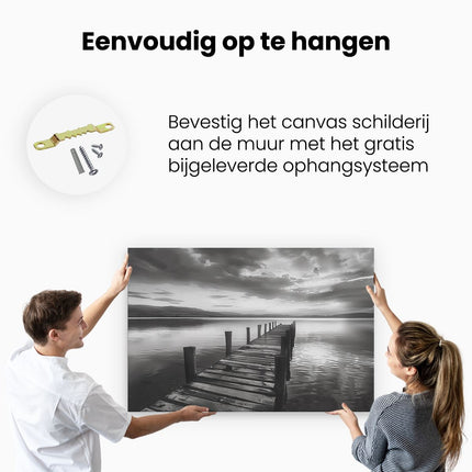 Canvas schilderij ophangen Houten Pier aan een Meer