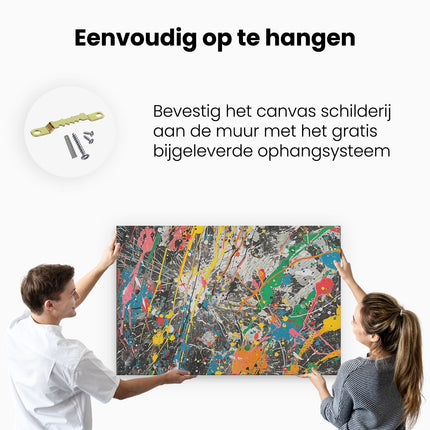 Canvas schilderij ophangen Kleurrijke Verfspatten op een Zwarte Achtergrond