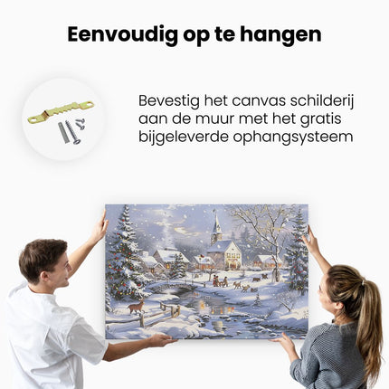 Canvas schilderij ophangen Kunstwerk van een Dorp in de Sneeuw