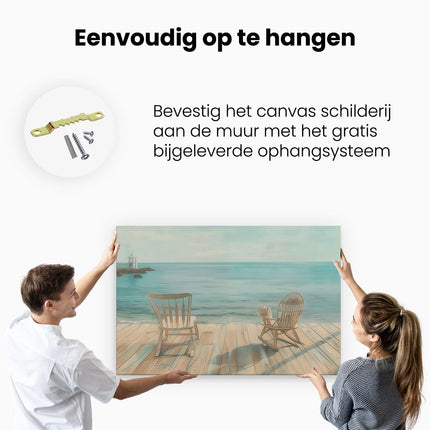 Canvas schilderij ophangen Twee Schommelstoelen op een Houten Terras met Uitzicht op de Oceaan