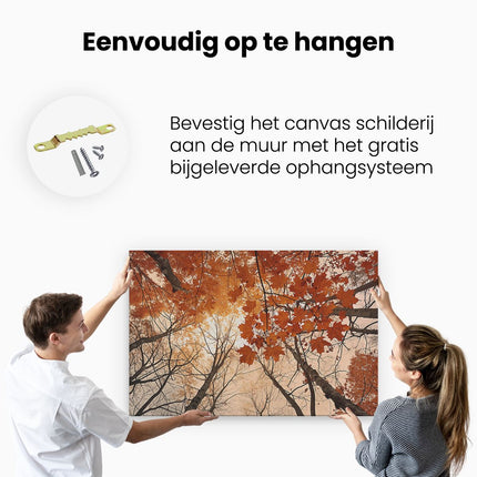 Canvas schilderij ophangen Herfstbladeren in de Bomen