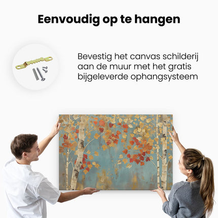 Canvas schilderij ophangen Berkenbomen met Herfstbladeren op een Blauwe Achtergrond