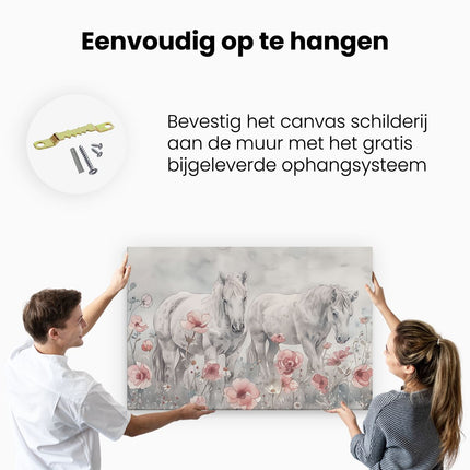 Canvas schilderij ophangen Twee Paarden in een Bloemenveld