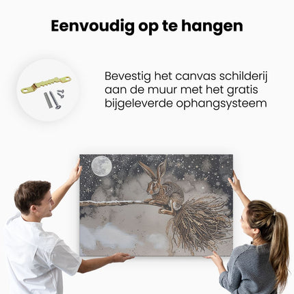 Canvas schilderij ophangen Haas met een Bezem in de Sneeuw