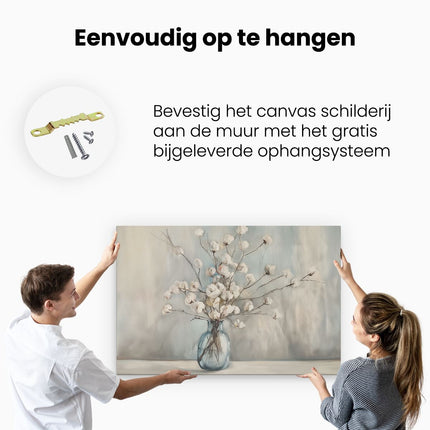 Canvas schilderij ophangen Witte Katoenen Bloemen in een Blauwe Vaas