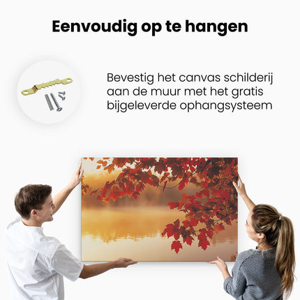 Canvas schilderij ophangen Herfstbladeren op een Meer