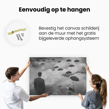Canvas schilderij ophangen Man in een Pak Kijkend naar Paraplu's die in de Lucht Vliegen