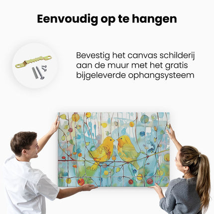 Canvas schilderij ophangen Twee Gele Vogels Zittend op een Tak