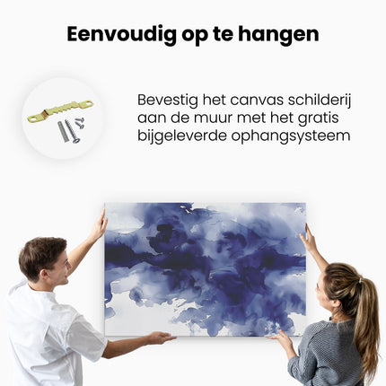 Canvas schilderij ophangen Blauwe Inktspatten op een Witte Achtergrond