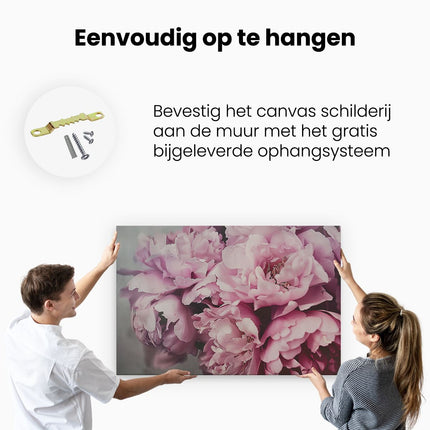 Canvas schilderij ophangen Roze Pioenrozen in een Vaas