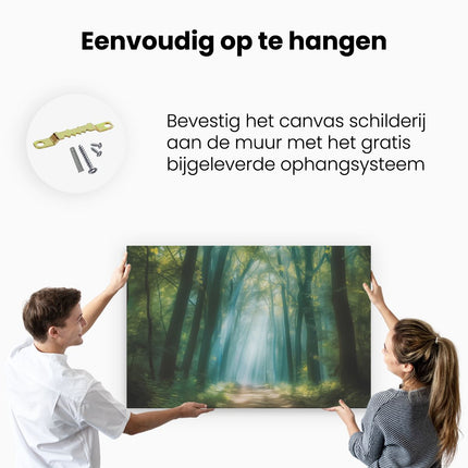 Canvas schilderij ophangen Pad door een Bos met Zonlicht dat door de Bomen Schijnt