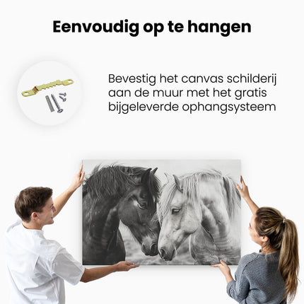 Canvas schilderij ophangen Twee Paarden Kijken Elkaar Aan