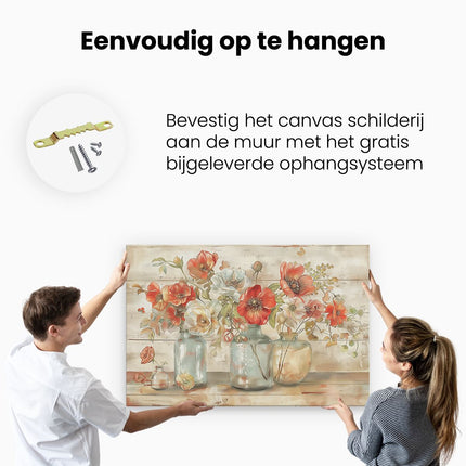 Canvas schilderij ophangen Kunstwerk van Bloemen in Glazen Potten op een Houten Tafel