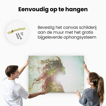 Canvas schilderij ophangen Vrouwenhoofd met een Boom op de Achtergrond
