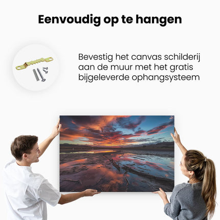 Canvas schilderij ophangen Kleurrijke Zonsondergang over een Meer