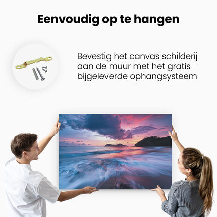 Canvas schilderij ophangen Zonsondergang over een Strand met Golven