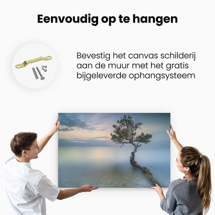 Canvas schilderij ophangen Eenzame Boom op een Strand bij Zonsondergang