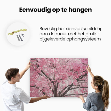 Canvas schilderij ophangen Roze Kersenbloesems op een Boom