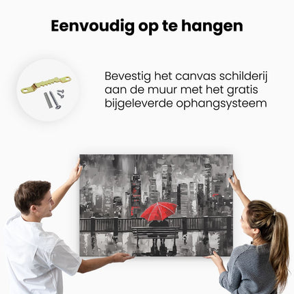 Canvas schilderij ophangen Paar Zittend op een Bankje met een Rode Paraplu