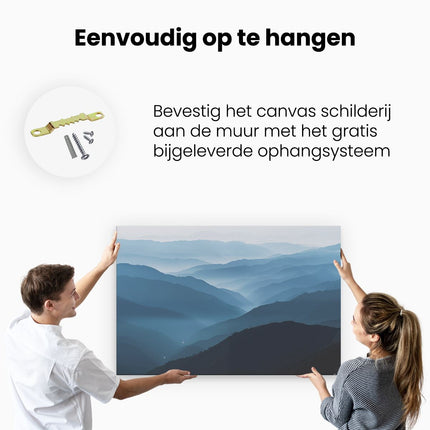 Canvas schilderij ophangen Er is een Bergketen op de Achtergrond