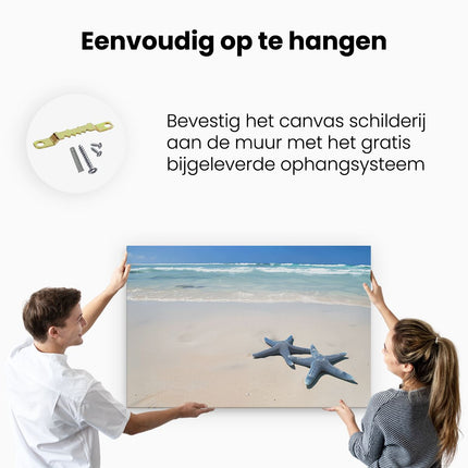 Canvas schilderij ophangen Twee Zeester op een Strand