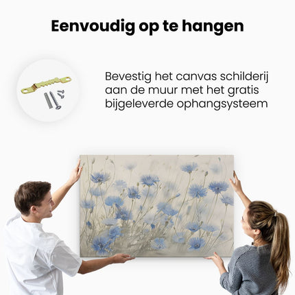 Canvas schilderij ophangen Blauwe Bloemen in een Veld