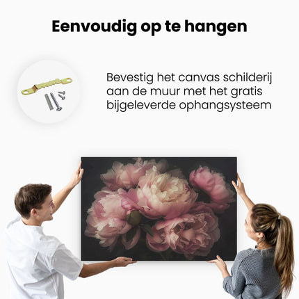 Canvas schilderij ophangen Roze Pioenrozen in een Vaas op een Zwarte Achtergrond