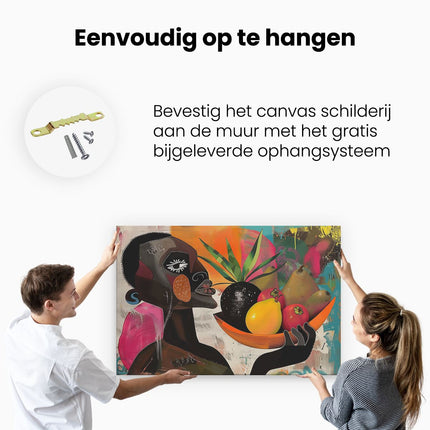 Canvas schilderij ophangen Man met een Schaal Fruit