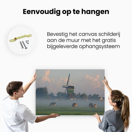 Canvas schilderij ophangen Landschap met Koeien