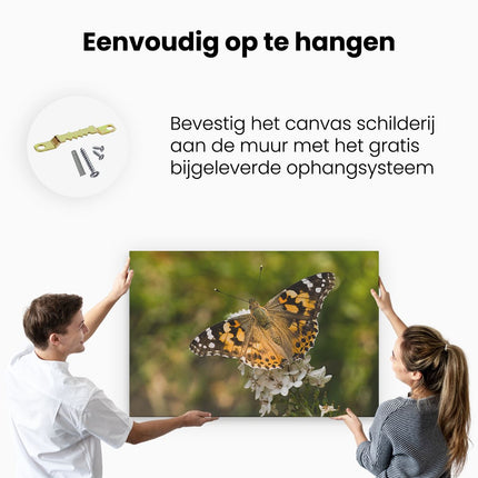 Canvas schilderij ophangen Vlinder op Bloem
