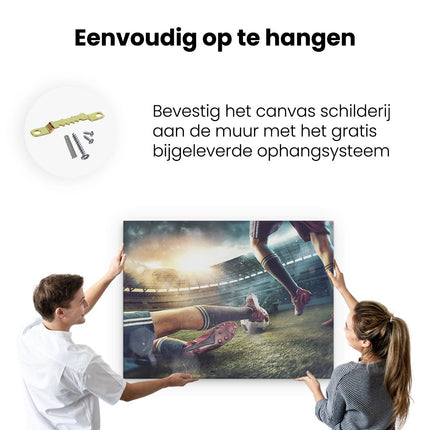 Canvas Schilderij Ophangen Voetbal Sliding In Het Stadion