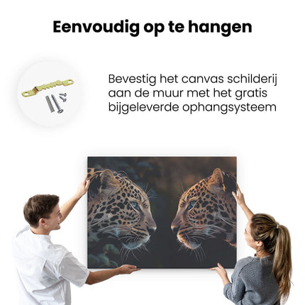 Canvas Schilderij Ophangen Twee Luipaarden die Elkaar Aankijken