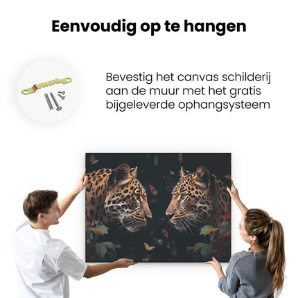 Canvas Schilderij Ophangen Twee Luipaarden die Elkaar Aankijken