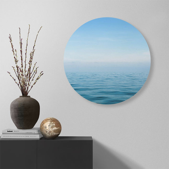 Wandcirkel muur Zee Met Een Blauw Hemel Achtergrond