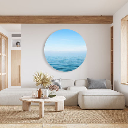 Wandcirkel woonkamer Zee Met Een Blauw Hemel Achtergrond
