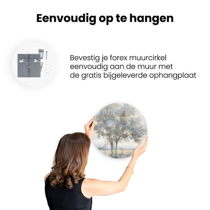 Wandcirkel ophangen Twee Bomen in een Veld