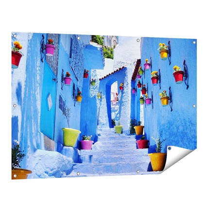 Tuinposter vooraanzicht Blauwe Huizen met Bloempotten in Chefchaouen, Marokko